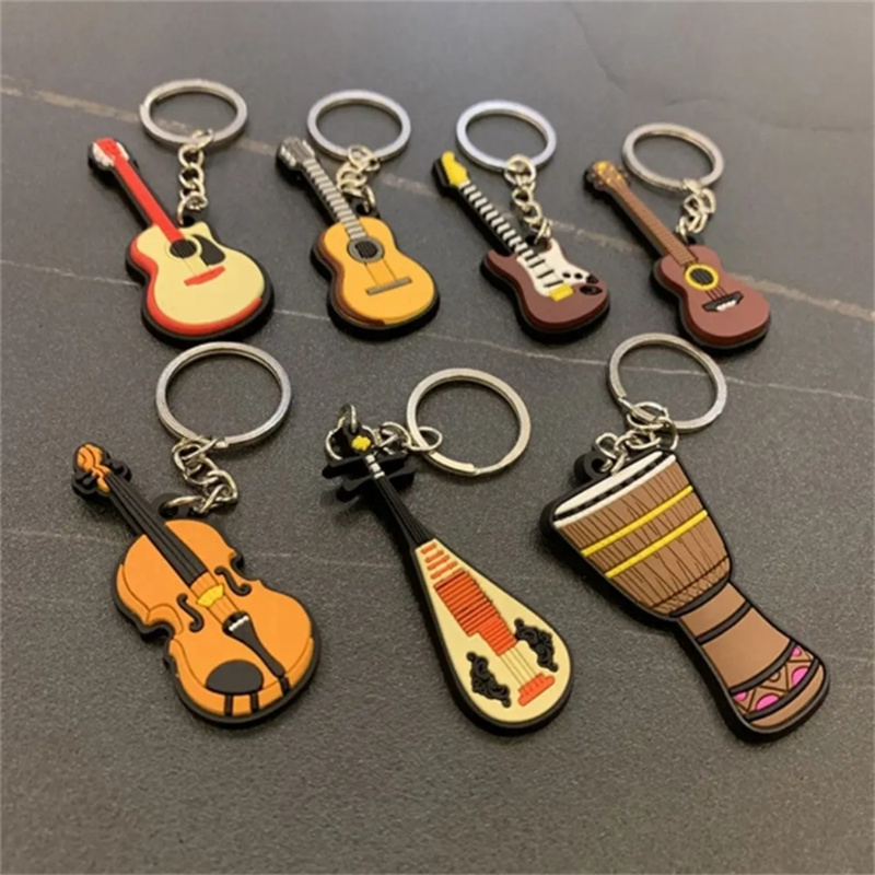新着ギターキーホルダー男性女性パンクバイオリン楽器シリコーン - Musical Instrument Photo のレビューと価格